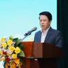 Ông Phạm Tiến Dũng - Phó Thống đốc Ngân hàng Nhà nước phát biểu tại hội thảo. (Ảnh: Vietnam+)