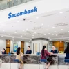 Giao dịch tại Sacombank. (Ảnh: PV/Vietnam+)