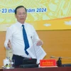 Ông Đào Minh Tú - Phó Thống đốc Ngân hàng Nhà nước phát biểu tại họp báo. (Ảnh: Vietnam+)