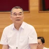Trung tướng Tô Ân Xô, người phát ngôn Bộ Công an trả lời tại họp báo Chính phủ. (Ảnh: Vietnam+)