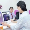Việc giao dịch chuyển tiền có giá trị từ 10 triệu đồng trở lên đều phải xác thực bằng sinh trắc học góp phần phòng, chống tội phạm sử dụng công nghệ cao trên không gian mạng. (Ảnh: Vietnam+)