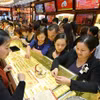 Giao dịch vàng tại doanh nghiệp. (Ảnh: Vietnam+)