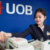 UOB dự báo tỷ giá có thể sẽ duy trì ở mức cao trong thời gian dài hơn. (Ảnh: Vietnam+)