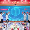 Đại diện lãnh đạo Agribank - VNPAY chính thức bấm nút ra mắt Giải pháp OSB. (Ảnh: Vietnam+)