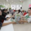 VPBank hỗ trợ gói vay trả nợ trước hạn tại ngân hàng khác lãi suất chỉ 4,6%. (Ảnh: Vietnam+)