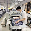 Standard Chartered dự báo GDP quý 2 sẽ ở mức vừa phải trong bối cảnh lạm phát gia tăng. (Ảnh: Vietnam+)