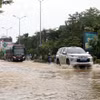 Nhiều tuyến đường ở thành phố Huế bị ngập trong nước do mưa lớn. (Ảnh: Đỗ Trưởng/TTXVN)