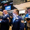 Hoạt động tại Sàn giao dịch chứng khoán New York, Mỹ. (Ảnh: THX/TTXVN)
