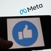 Biểu tượng của Meta trên màn hình máy tính. (Ảnh: AFP/TTXVN)