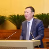 Tổng Thanh tra Chính phủ Đoàn Hồng Phong trình bày Báo cáo về công tác tiếp công dân, giải quyết khiếu nại, tố cáo. (Ảnh: Doãn Tấn/TTXVN)