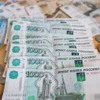 Đồng ruble của Nga trượt qua ngưỡng 100 ruble đổi 1 USD 