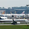 Máy bay của hãng hàng không Singapore Airlines tại sân bay Changi ở Singapore. (Ảnh: AFP/TTXVN)