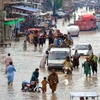 Cảnh ngập lụt sau những trận mưa lớn tại Jaffarabad, Pakistan. (Ảnh: AFP/TTXVN)