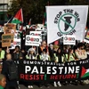 Tuần hành ủng hộ người Palestine tại London, Anh ngày 11/11/2023. (Ảnh: AFP)