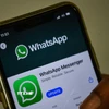 Biểu tượng ứng dụng WhatsApp trên màn hình điện thoại di động. (Ảnh: AFP/TTXVN)