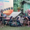 Đoàn nghệ nhân huyện Lắk trình diễn tái hiện trích đoạn Lễ cúng rước hồn lúa về kho của dân tộc Mnông Gar tại Lễ bế mạc. (Ảnh: Hoài Thu/TTXVN)