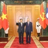 Tổng Bí thư, Chủ tịch nước Tô Lâm và Tổng Bí thư, Chủ tịch nước Lào Thongloun Sisoulith chụp ảnh chung trước khi hội đàm. (Ảnh: Trí Dũng/TTXVN)