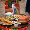 Mâm cỗ truyền thống làng cổ Đường Lâm không thể thiếu gà Mía, canh bóng, cá kho, thịt quay đòn, củ cải xào rau củ... (Ảnh: Mai Mai/Vietnam+)