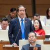 Bộ trưởng Nguyễn Kim Sơn trả lời chất vấn trước Quốc hội. (Ảnh: CTV/Vietnam+)