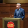 Bộ trưởng Bộ Công An Tô Lâm trình bày báo cáo trước Quốc hội. (Ảnh: CTV/Vietnam+)