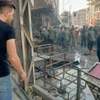 Hiện trường vụ nổ bom tại thị trấn Sayyida Zeinab, ngoại ô Damascus, Syria, ngày 27/7/2023. (Ảnh: AFP/TTXVN)