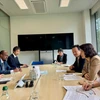 Đoàn Việt Nam làm việc tại trụ sở của GAVI. (Ảnh: TTXVN phát)