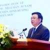 Giáo sư-Tiến sỹ Nguyễn Xuân Thắng, Uỷ viên Bộ Chính trị, Giám đốc Học viện Chính trị quốc gia Hồ Chí Minh, Chủ tịch Hội đồng Lý luận Trung ương phát biểu khai mạc. (Ảnh: Lâm Khánh/TTXVN)