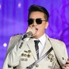 Huy hiệu lạ gây xôn xao dư luận mà ca sỹ Đàm Vĩnh Hưng sử dụng trong liveshow "Ngày em thắp sao trời." (Nguồn: Facebook)