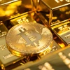 Giao dịch bitcoin được dự đoán sẽ phổ biến hơn cả vàng. (Nguồn: iStock)