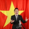 Tùng Dương hát Quốc ca trong niềm tự hào dân tộc. (Ảnh: NVCC)