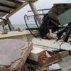 Nhiều nhà ở của người dân phường Cẩm An, thành phố Hội An bị sóng biển đánh sập. (Ảnh: Đoàn Hữu Trung/TTXVN)