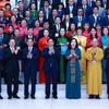 Thủ tướng Phạm Minh Chính với các đại biểu dự Hội nghị người Việt Nam ở nước ngoài trên toàn thế giới lần thứ IV. (Ảnh: Dương Giang/TTXVN)