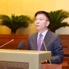 Phó Thủ tướng Chính phủ, Bộ trưởng Bộ Tư pháp Lê Thành Long phát biểu làm rõ thêm một số vấn đề liên quan thuộc trách nhiệm của Chính phủ. (Ảnh: Doãn Tấn/TTXVN)
