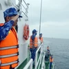 Cảnh sát biển Việt Nam - Trung Quốc tuần tra chung trên vùng biển phía Bắc Vịnh Bắc Bộ. (Ảnh: TTXVN)