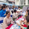 Ngày hội cung cấp thông tin cho học sinh, sinh viên và phụ huynh về chất lượng đào tạo nhân lực ngành Văn hóa, Thể thao, Du lịch. (Ảnh: Minh Thu/Vietnam+)