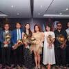 Đại diện gia đình và nghệ sỹ tham gia dự án "Legacy of Love" tri ân nhạc sỹ Thanh Tùng. (Ảnh: PV/Vietnam+)