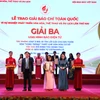 Phóng viên Báo Điện tử VietnamPlus nhận Giải Ba. (Ảnh: PV/Vietnam+)