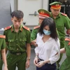 Bị can Trần Thị Ngọc Trinh. (Ảnh: Thành Chung/Vietnam+)