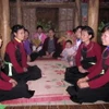 Đội văn nghệ hát Sình Ca dân tộc Cao Lan ở xã Kim Phú, huyện Yên Sơn. (Ảnh: Quang Đán/TTXVN)