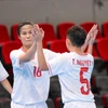 Futsal nữ Việt Nam dễ dàng đánh bại Indonesia để trở lại ngôi đầu bảng. (Nguồn: VFF)