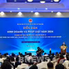 Khai mạc Diễn đàn kinh doanh và pháp luật năm 2024. (Ảnh: Ngọc Quỳnh/TTXVN)
