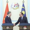 Tổng Bí thư Tô Lâm với Thủ tướng Malaysia Anwar Ibrahim tại buổi họp báo. (Ảnh: Thống Nhất/TTXVN)