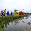 Đoàn rước thần trong Lễ hội Đình Vạn Ninh (Nguồn: Báo Quảng Ninh)