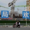 Các tòa nhà đang xây dựng của Tập đoàn Phát triển Bất động sản Evergrande ở Quảng Đông, Trung Quốc. (Ảnh: AFP/TTXVN)