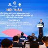 Thứ trưởng Bộ Y tế Trần Văn Thuấn phát biểu tại Hội thảo. (Ảnh: PV/Vietnam+)