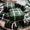 Bánh chưng là một thực phẩm quen thuộc ngày Tết. (Ảnh: PV/Vietnam+)