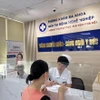 Người dân đến khám tại Phòng khám Đa khoa và Khám bệnh nghề nghiệp tại địa chỉ 35 Lê Văn Thiêm, Thanh Xuân Hà Nội. (Ảnh: T.G/Vietnam+)