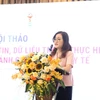 Bà Trần Thị Trang - Vụ trưởng Vụ Bảo hiểm Y tế (Bộ Y tế) phát biểu tại hội thảo. (Ảnh: PV/Vietnam+)