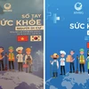 Sổ tay sức khỏe người di cư dành cho lao động Việt Nam đi làm việc tại Nhật Bản và Hàn Quốc. (Ảnh: PV/Vietnam+)