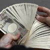 Đồng tiền mệnh giá 10.000 yen của Nhật Bản. (Ảnh: AFP/TTXVN)